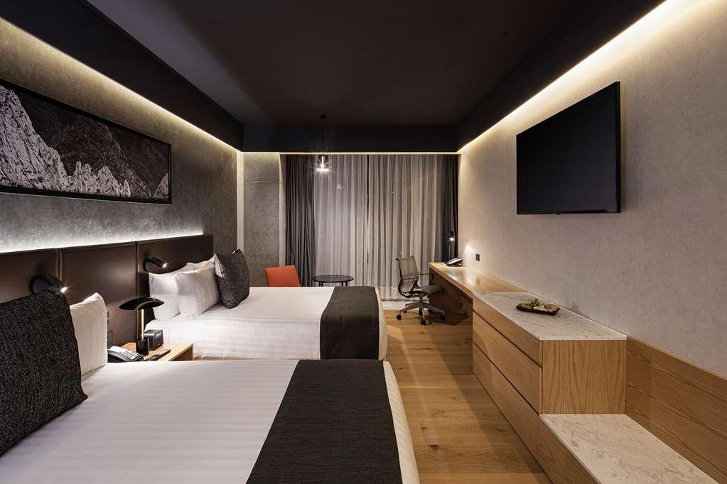 Galeria Plaza Monterrey Hotel Kamer foto A room at the hotel